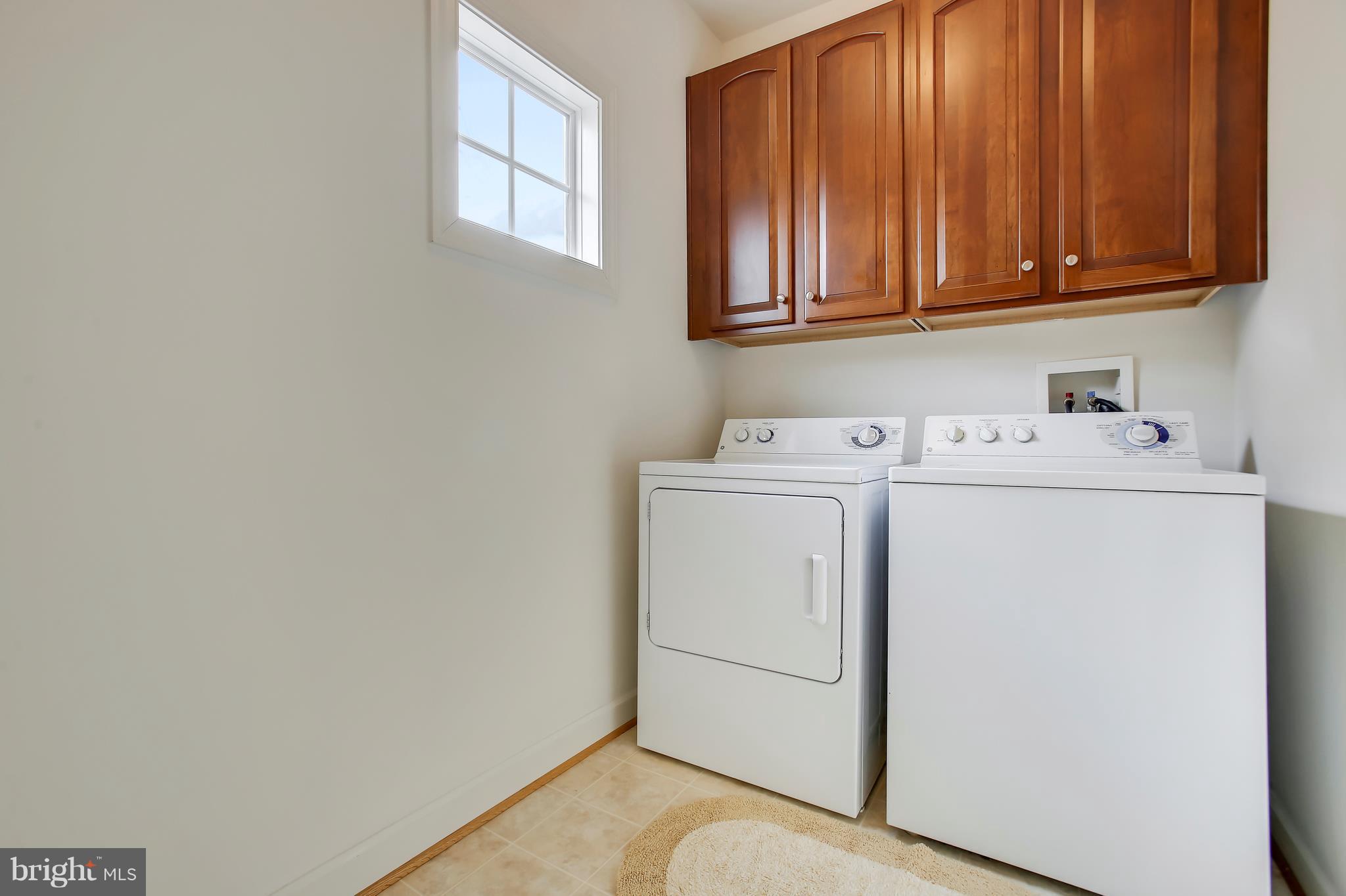 12312 Cypress Spring Road Clarksburg, MD 20871 - Photo 21 of 30 a utility room with dryer and washer