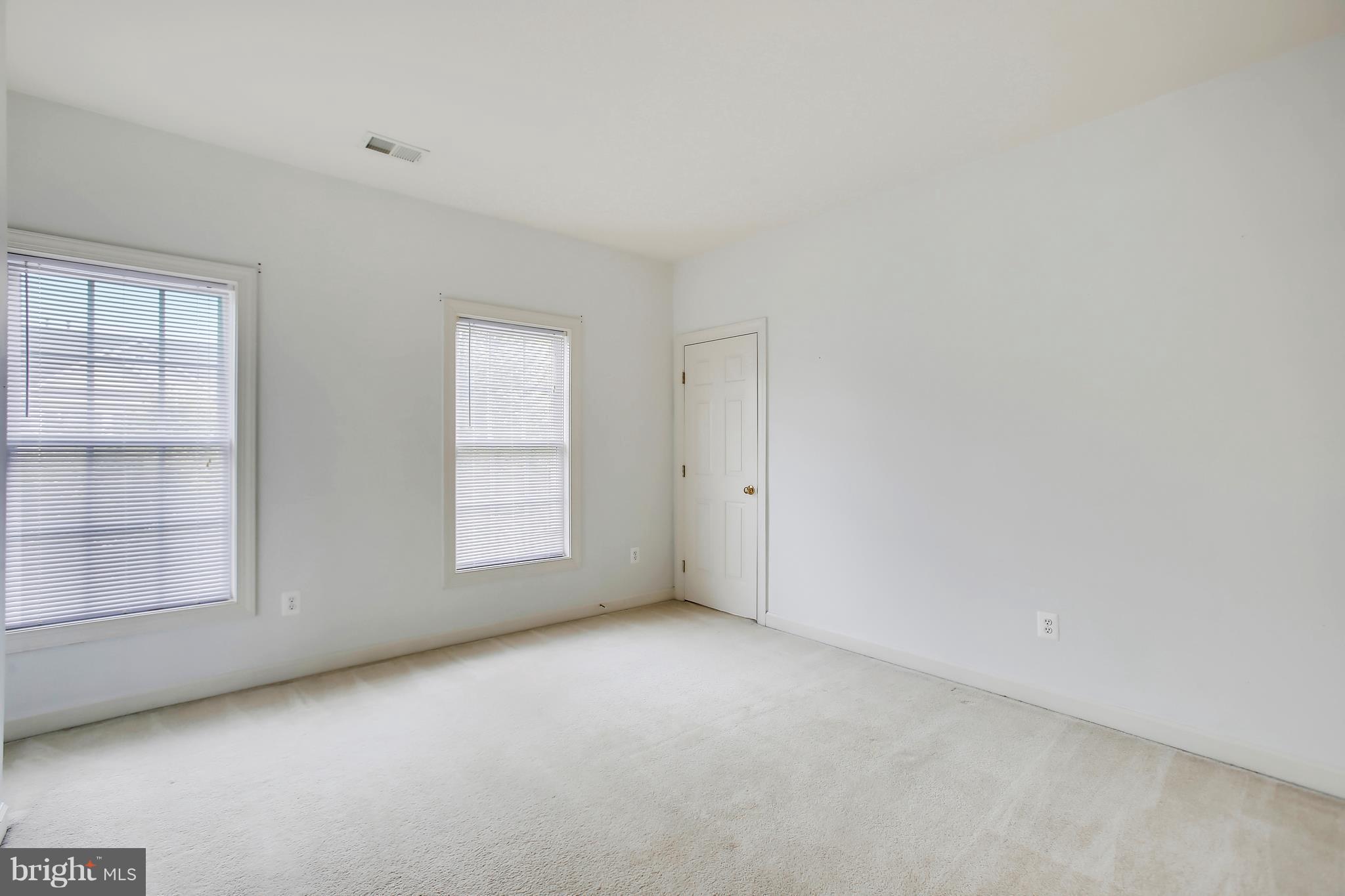 12312 Cypress Spring Road Clarksburg, MD 20871 - Photo 22 of 30 an empty room with windows