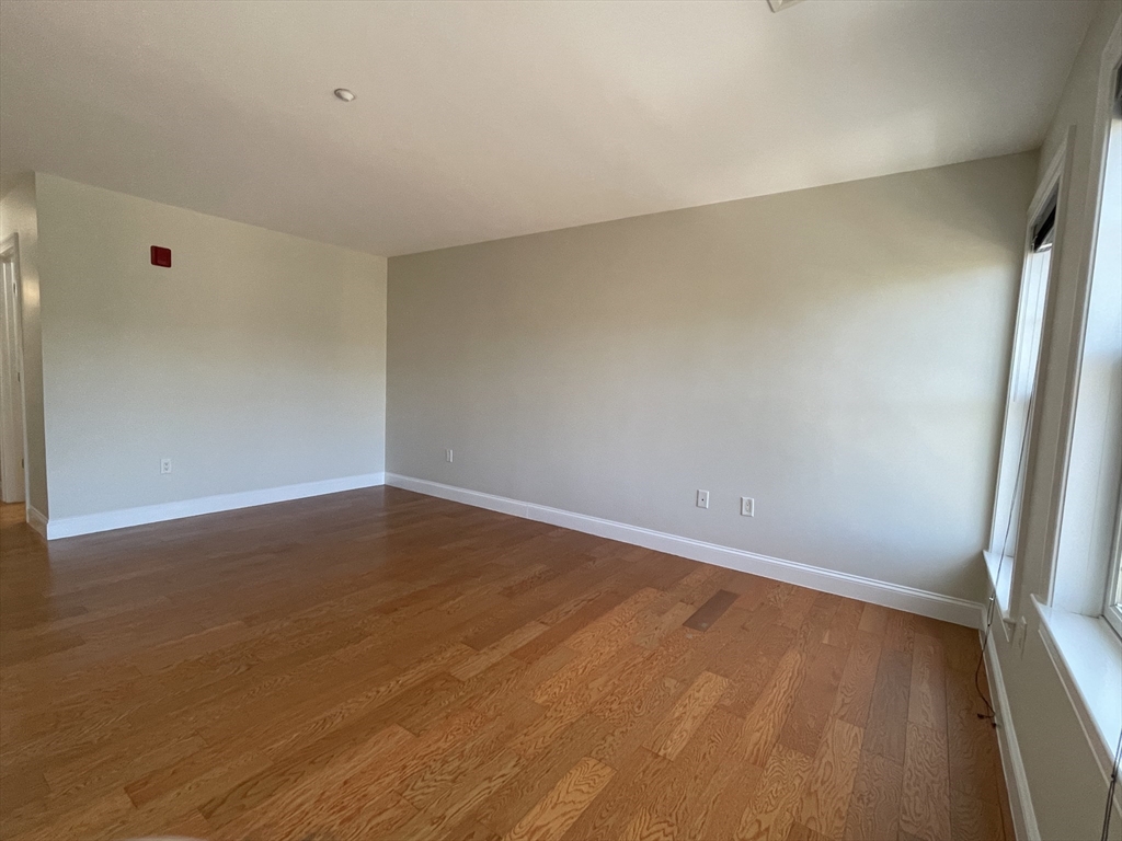 5170 Washington Street, Unit 3 Boston, MA 02132 - Photo 29 of 42 a view of an empty room