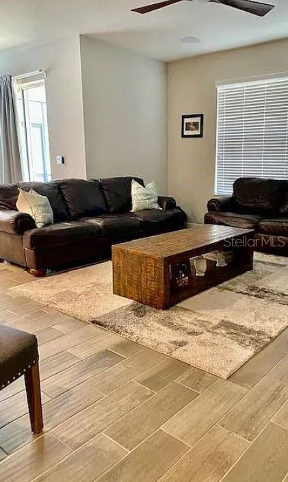 1049 Multiflora Loop Lutz, FL 33558 - Photo 13 of 49 a living room with furniture