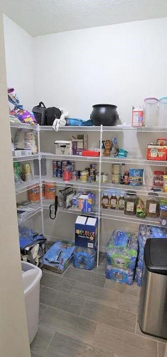 1049 Multiflora Loop Lutz, FL 33558 - Photo 16 of 49 a room with storage and utility