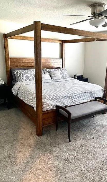 1049 Multiflora Loop Lutz, FL 33558 - Photo 33 of 49 a bedroom with a bed and window