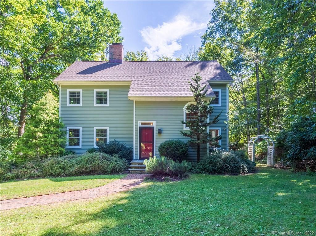 15 Middlebrook Pond Road Redding, CT 06896 - Photo 1 of 1 a front view of a house with a yard