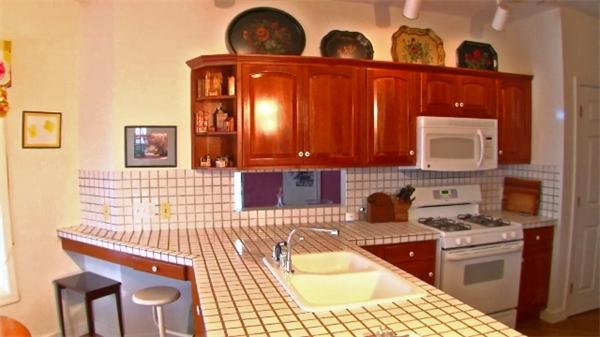 185 Sumner Avenue, Unit 185 Springfield, MA 01108 - Photo 2 of 23 a kitchen with stainless steel appliances granite countertop a stove a sink and a microwave
