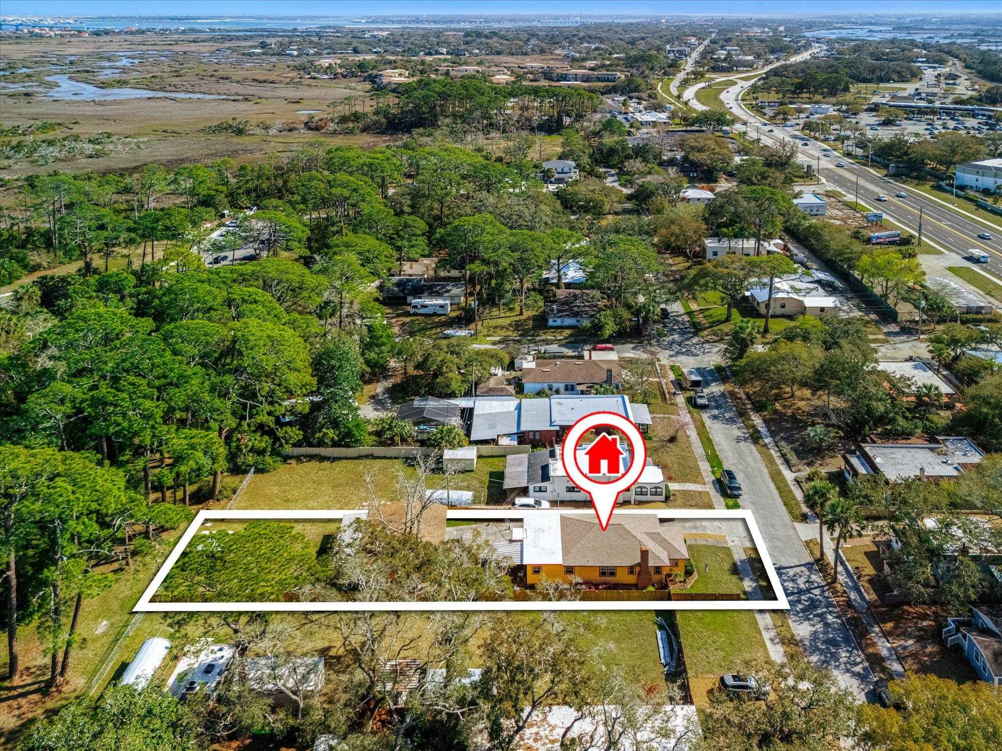 116 Colon Avenue St. Augustine, FL 32084 - Photo 39 of 42 Aerial view of property and surrounding area with nearby suburban area and property parcel outlined