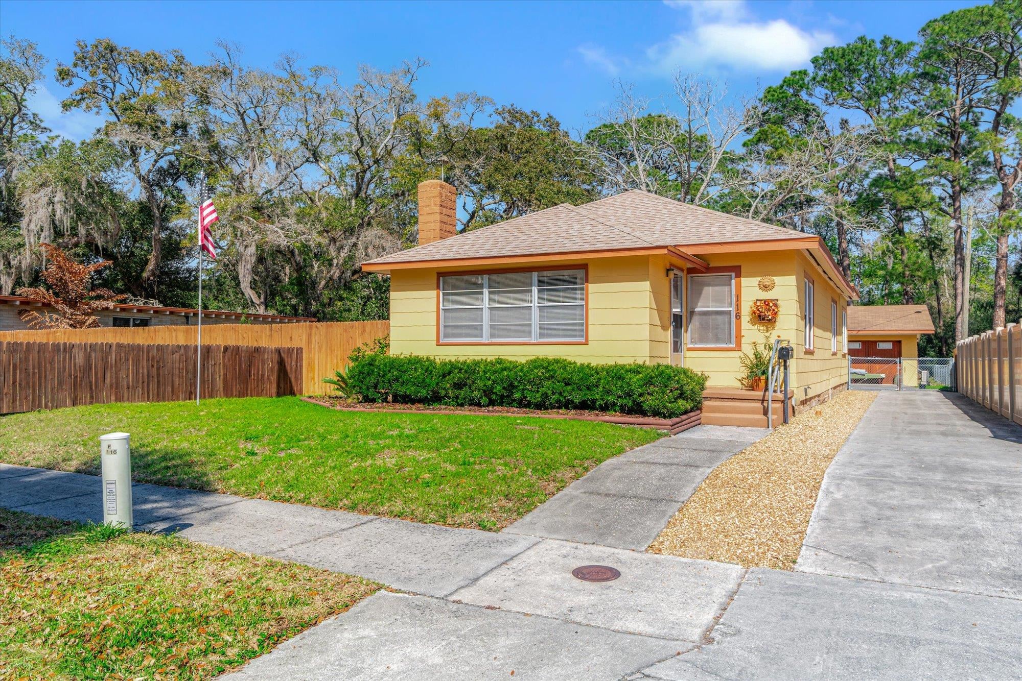 116 Colon Avenue St. Augustine, FL 32084 - Photo 40 of 42 Bungalow with a chimney and roof with shingles