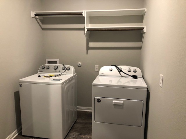 1237 Oak Chase Way Leander, TX 78641 - Photo 19 of 19 a utility room with dryer and washer