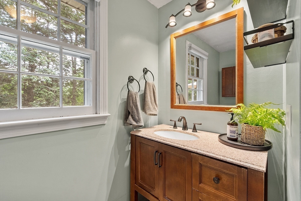 14 Emery Road Townsend, MA 01469 - Photo 17 of 31 a bathroom with a sink and a mirror