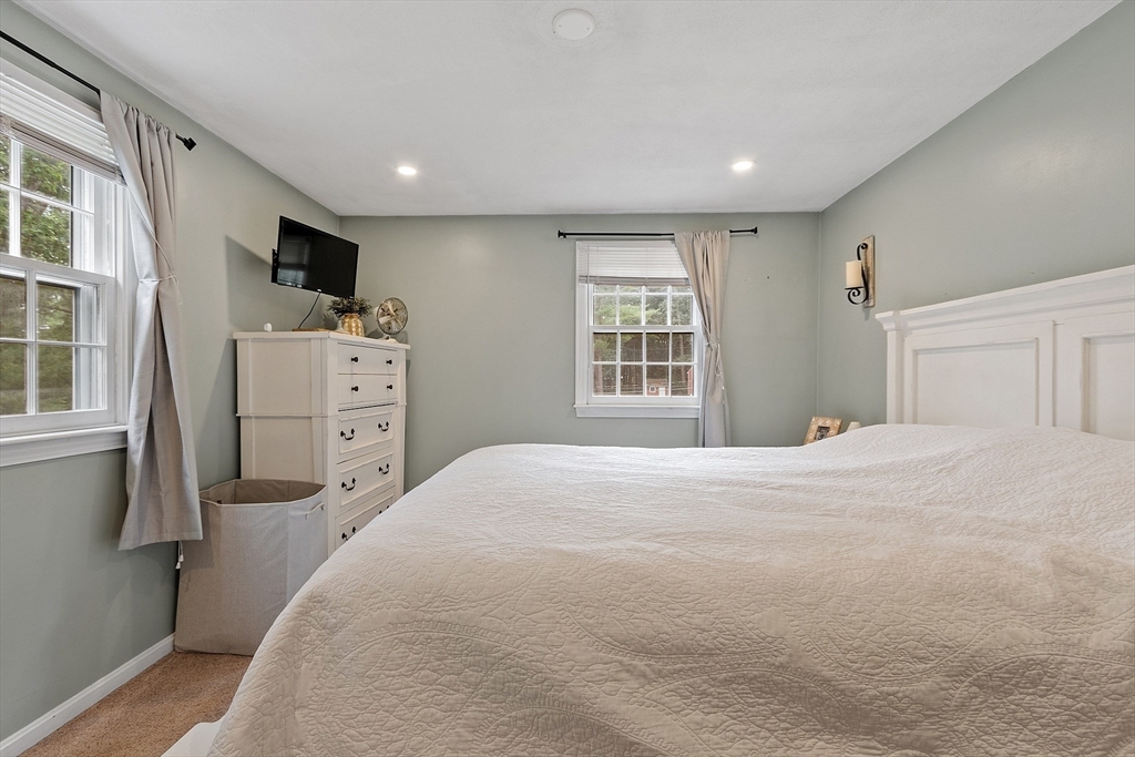 14 Emery Road Townsend, MA 01469 - Photo 19 of 31 a bedroom with a large bed and a window
