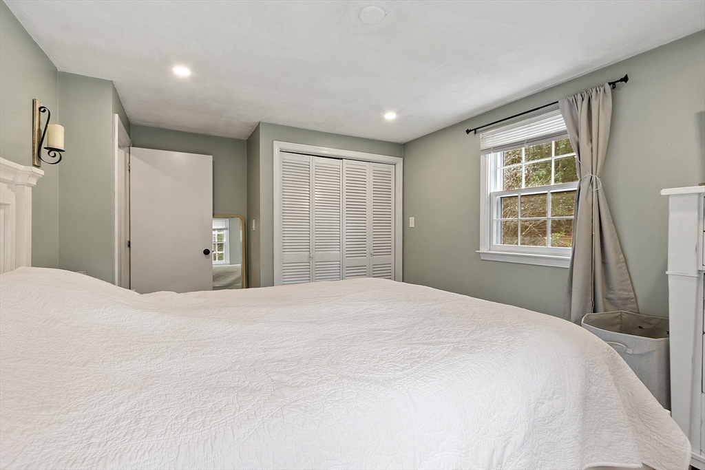 14 Emery Road Townsend, MA 01469 - Photo 20 of 31 a bedroom with a bed and a large window