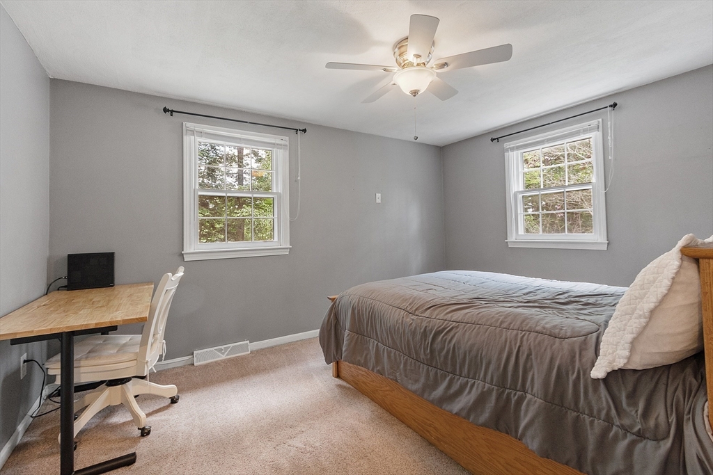 14 Emery Road Townsend, MA 01469 - Photo 21 of 31 a bedroom with a bed window and a desk