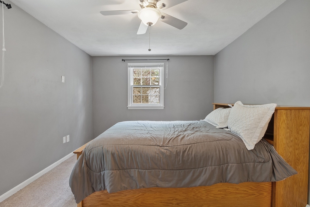 14 Emery Road Townsend, MA 01469 - Photo 22 of 31 a bedroom with a bed and window