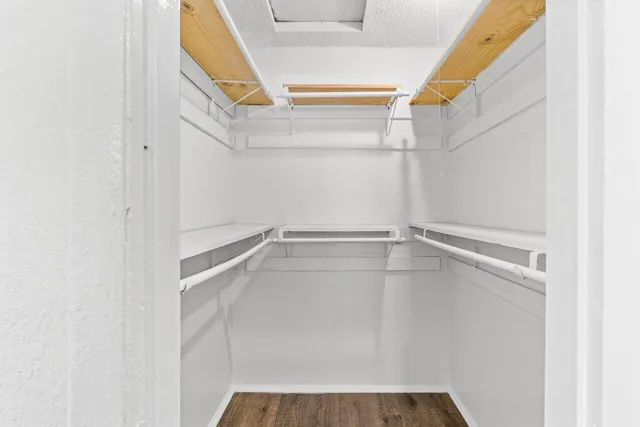 a view of an empty walk in closet