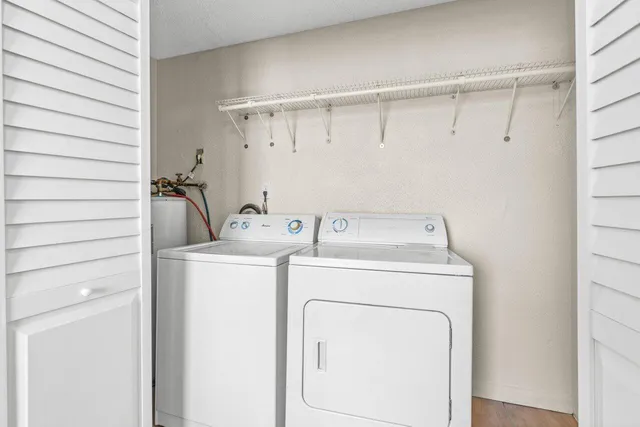 a utility room with dryer and washer