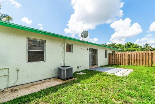 a view of a backyard with plants
