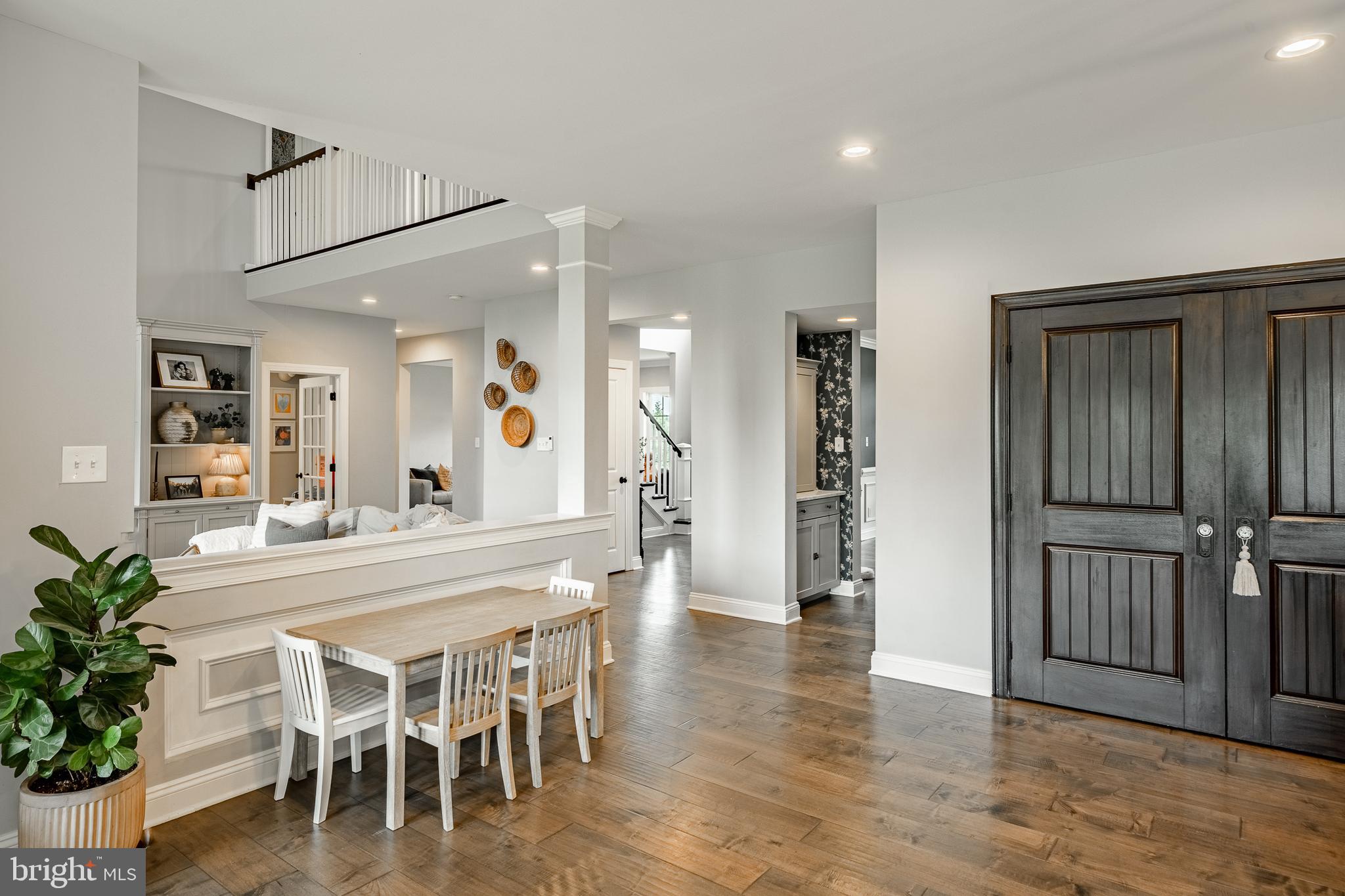 2084 Flowing Springs Road Chester Springs, PA 19425 - Photo 22 of 73 a view of a dining room with furniture and wooden floor