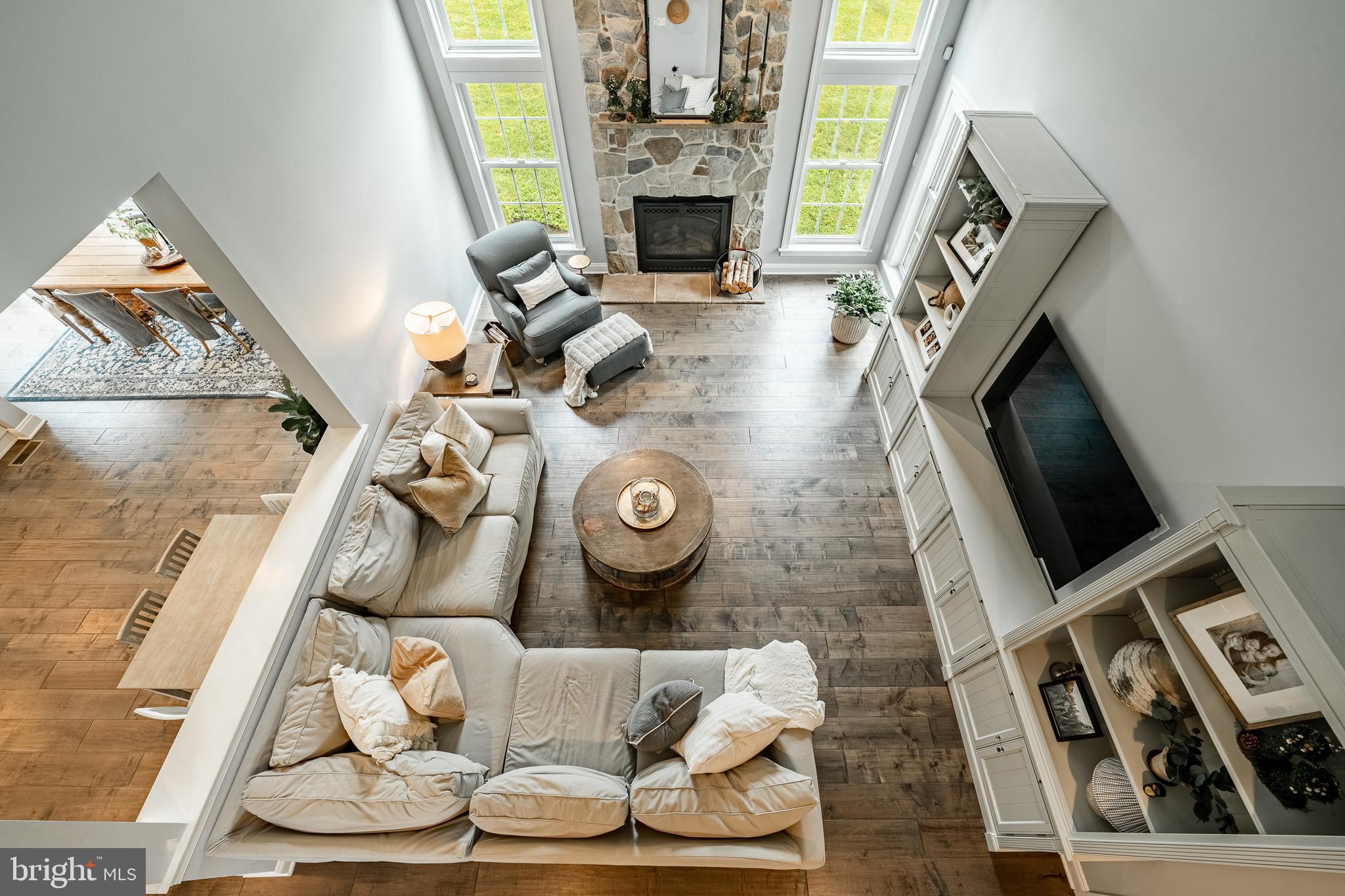 2084 Flowing Springs Road Chester Springs, PA 19425 - Photo 31 of 73 a living room with furniture and a fireplace