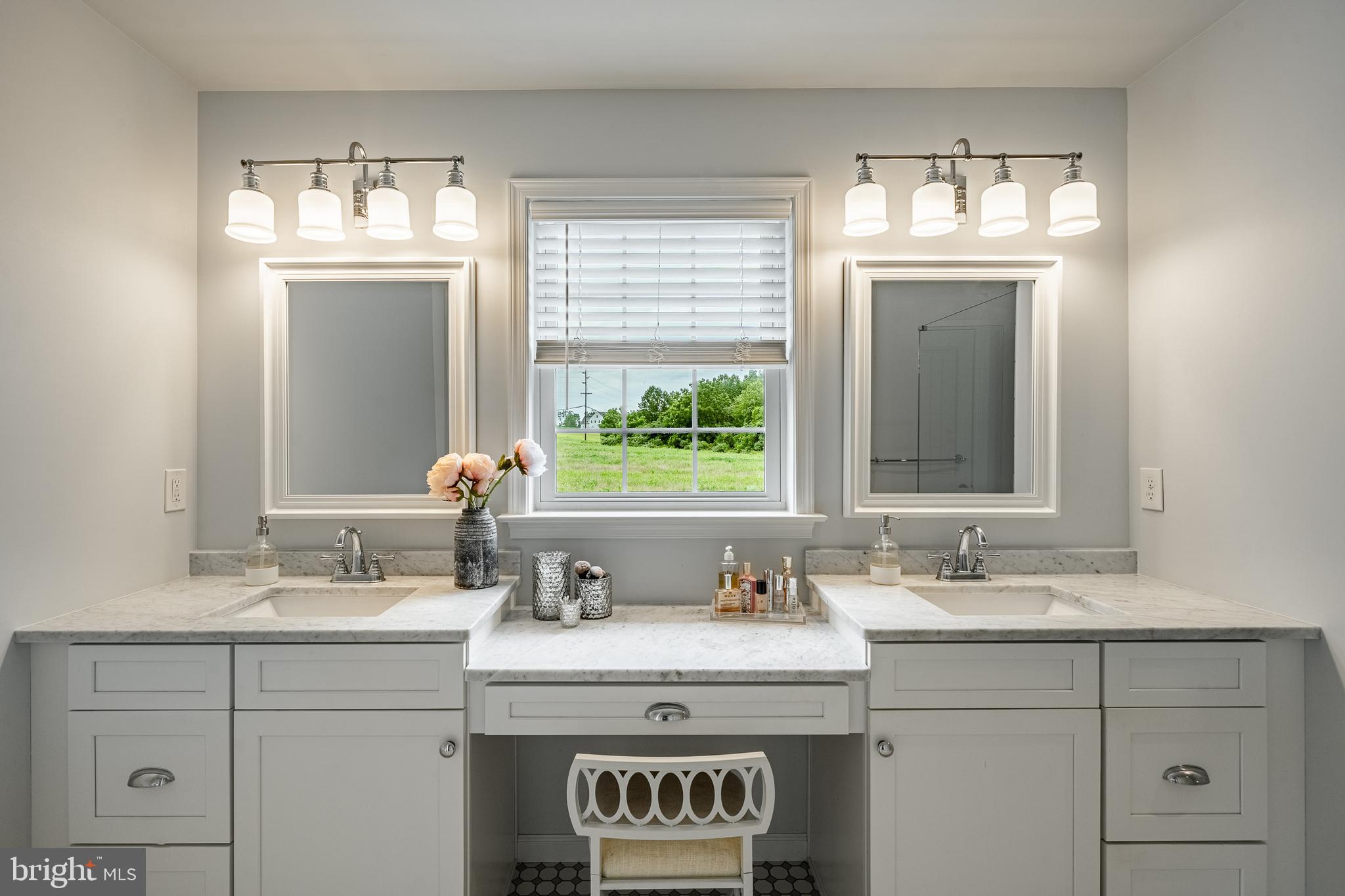 2084 Flowing Springs Road Chester Springs, PA 19425 - Photo 35 of 73 a bathroom with a sink and a mirror