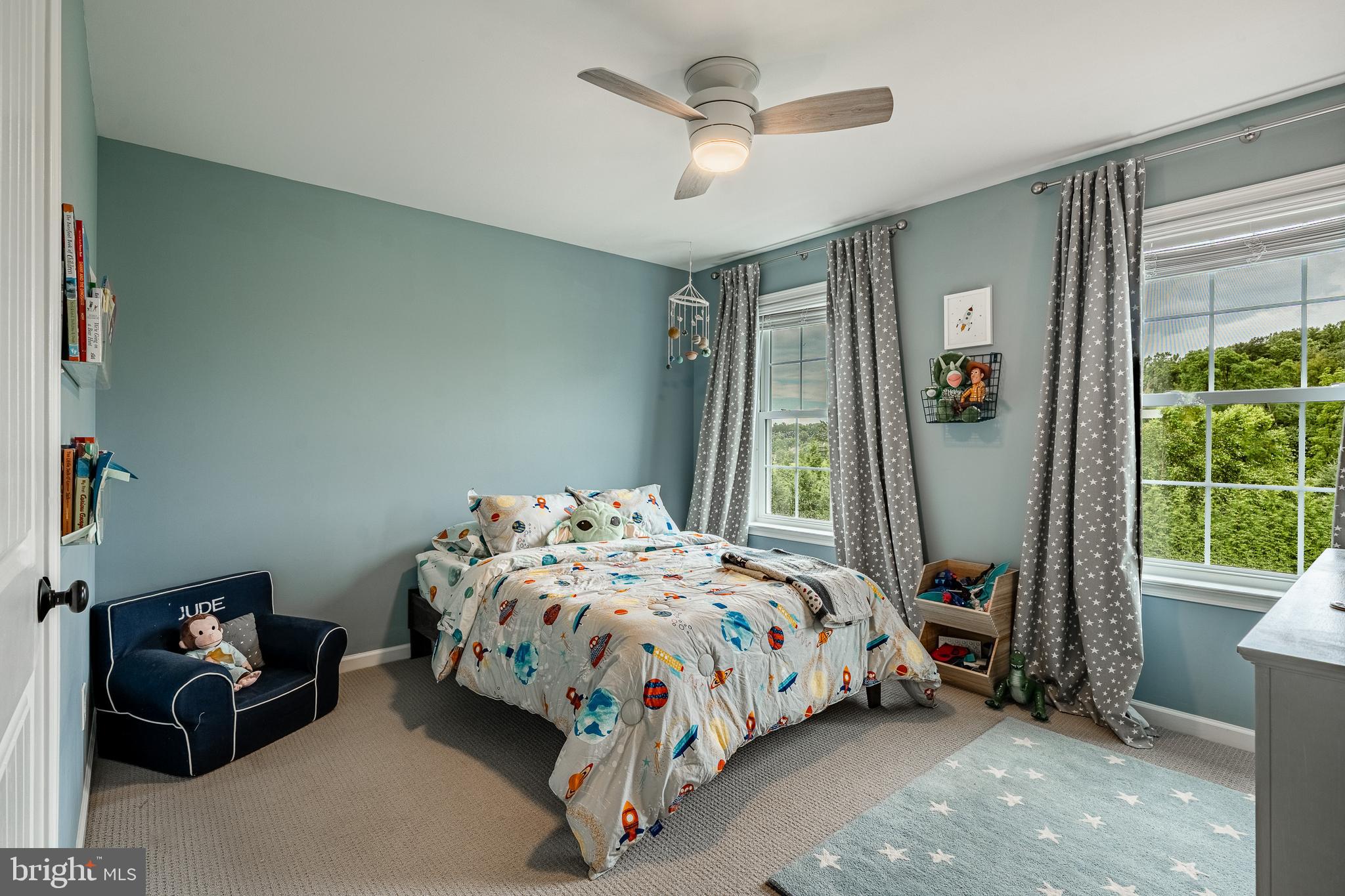 2084 Flowing Springs Road Chester Springs, PA 19425 - Photo 43 of 73 a bedroom with a bed a couch and a window
