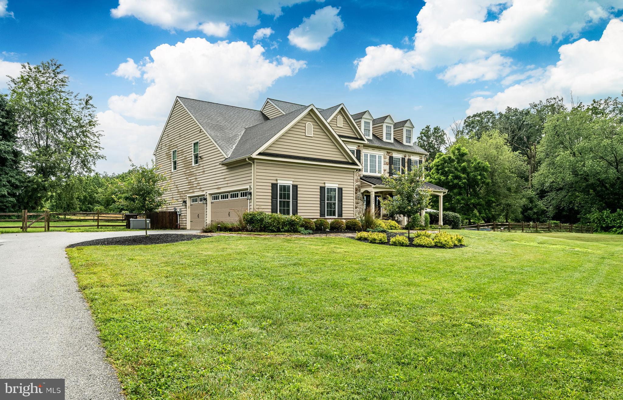 2084 Flowing Springs Road Chester Springs, PA 19425 - Photo 46 of 73 a front view of a house with garden