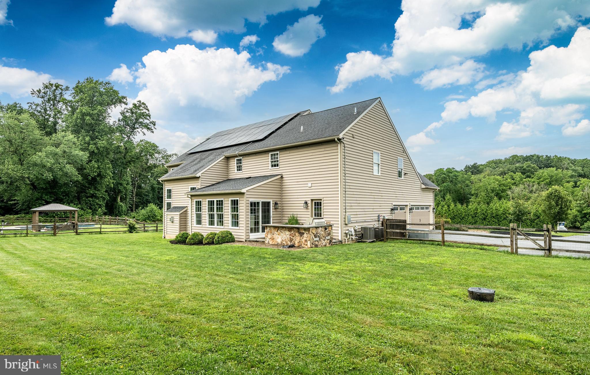 2084 Flowing Springs Road Chester Springs, PA 19425 - Photo 47 of 73 a view of a house with a yard