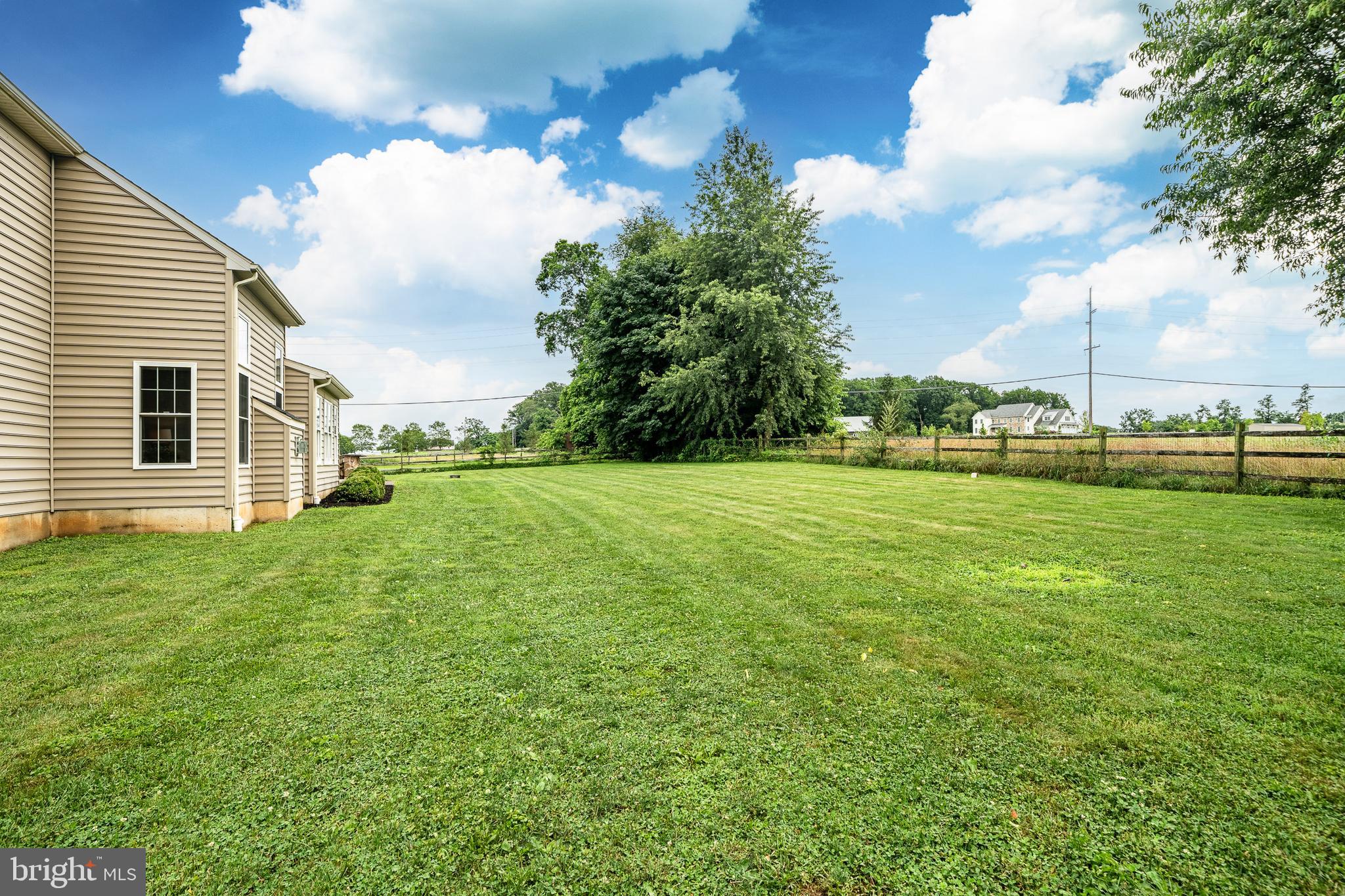 2084 Flowing Springs Road Chester Springs, PA 19425 - Photo 51 of 73 a backyard of a house with lots of green space