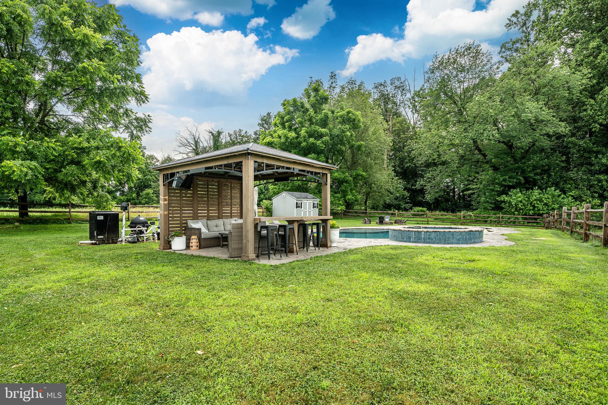 2084 Flowing Springs Road Chester Springs, PA 19425 - Photo 53 of 73 a view of a house with a yard and sitting area