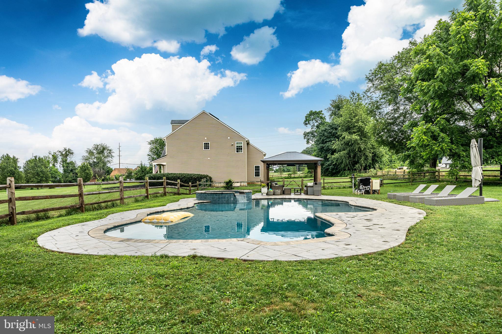 2084 Flowing Springs Road Chester Springs, PA 19425 - Photo 56 of 73 a view of a house with a yard