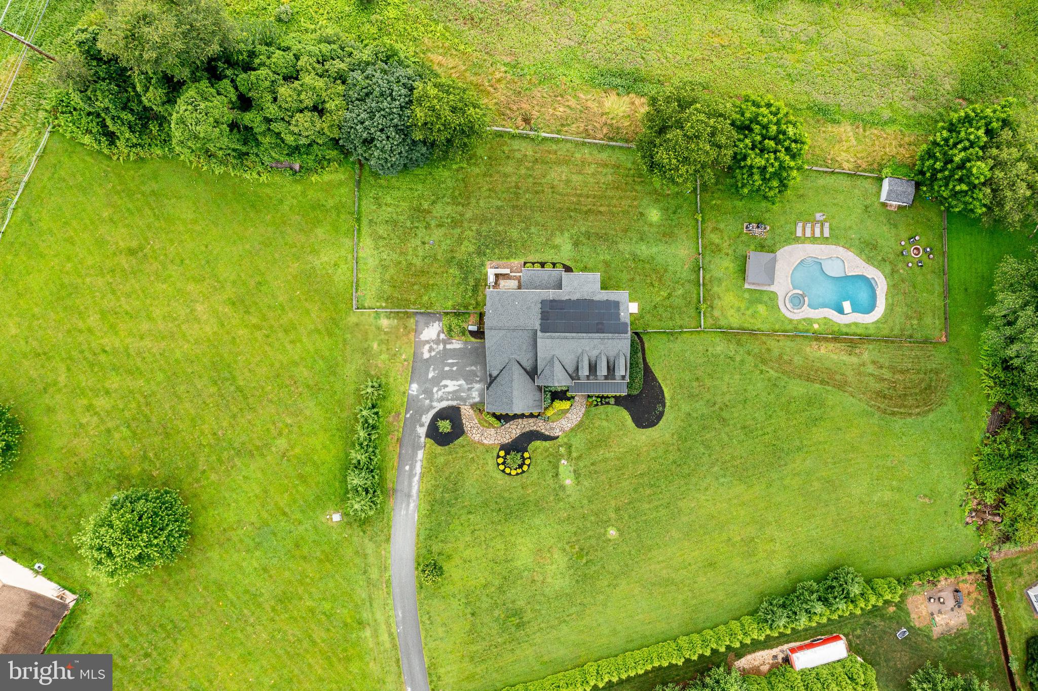 2084 Flowing Springs Road Chester Springs, PA 19425 - Photo 59 of 73 a view of a lake from a yard