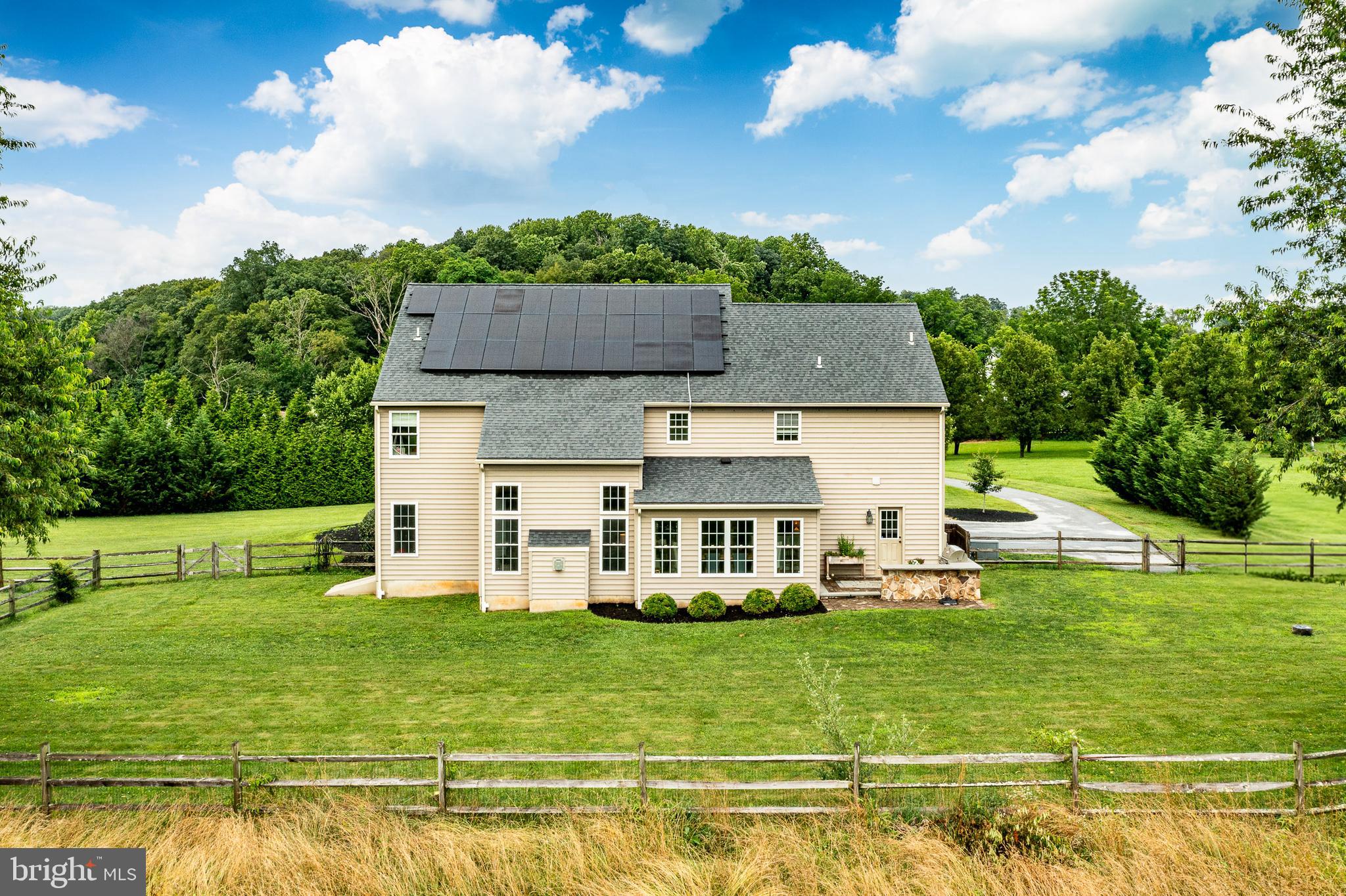 2084 Flowing Springs Road Chester Springs, PA 19425 - Photo 64 of 73 a view of a house with a big yard