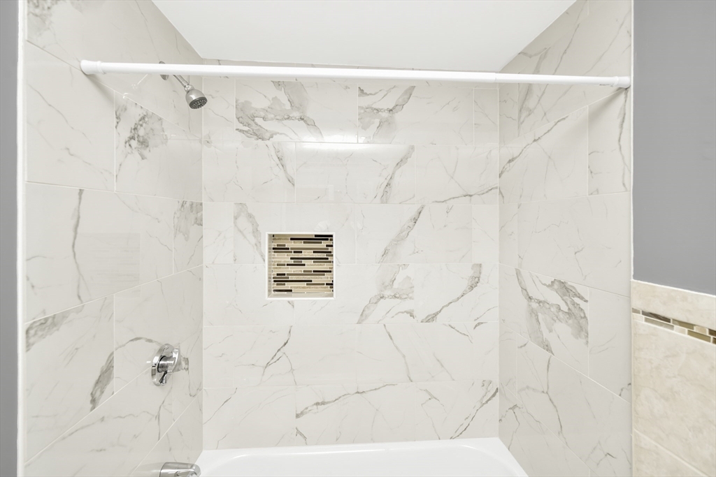 11 Greendale Road, Unit 2 Boston, MA 02126 - Photo 23 of 25 a bathroom with a shower