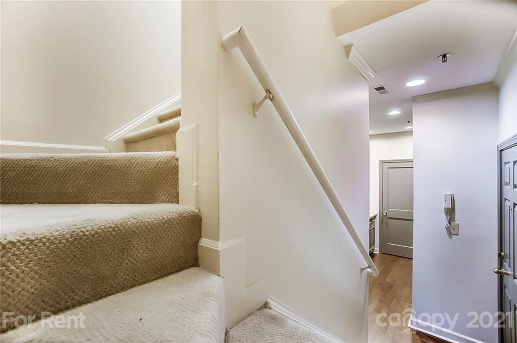 416 Queens Road Charlotte, NC 28207 - Photo 11 of 25 a view of hallway with stairs