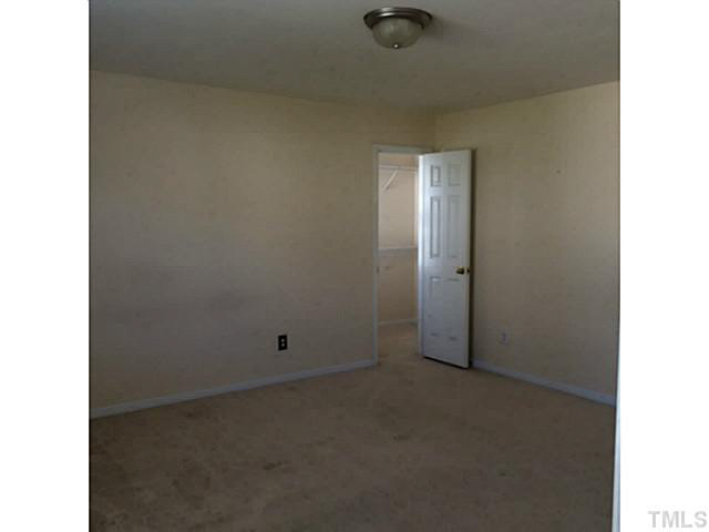 4240 Beacon Crest Way Raleigh, NC 27604 - Photo 13 of 16 Gigantic master bedroom with a walk-in closet.