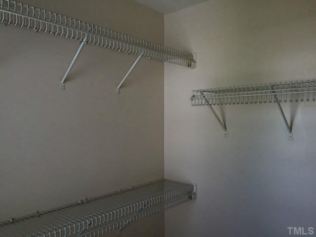 4240 Beacon Crest Way Raleigh, NC 27604 - Photo 14 of 16 A walk-in closet with...