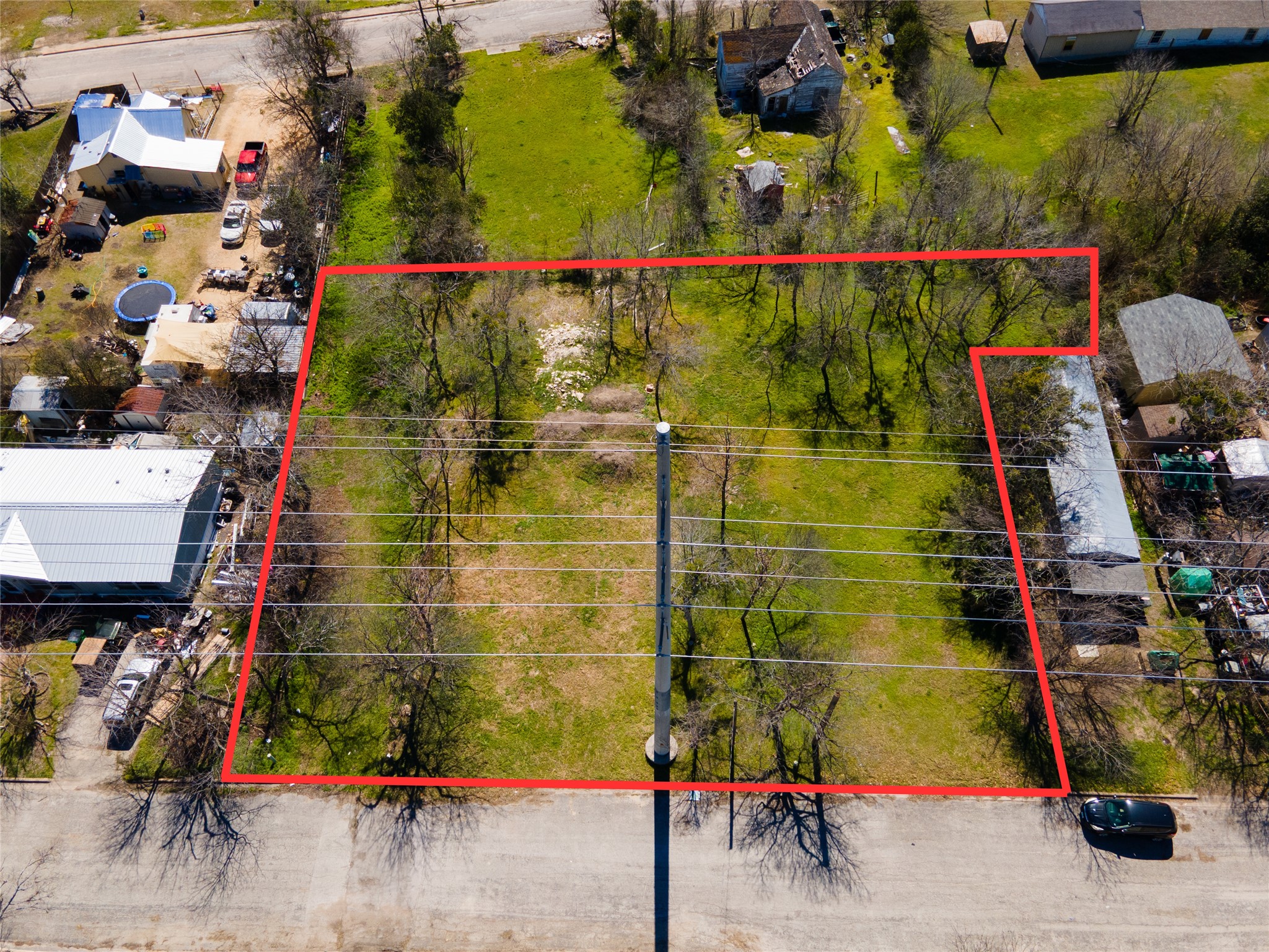 314 East Pecan Street Taylor, TX 76574 - Photo 3 of 7 Aerial overview of property's location featuring property boundaries highlighted