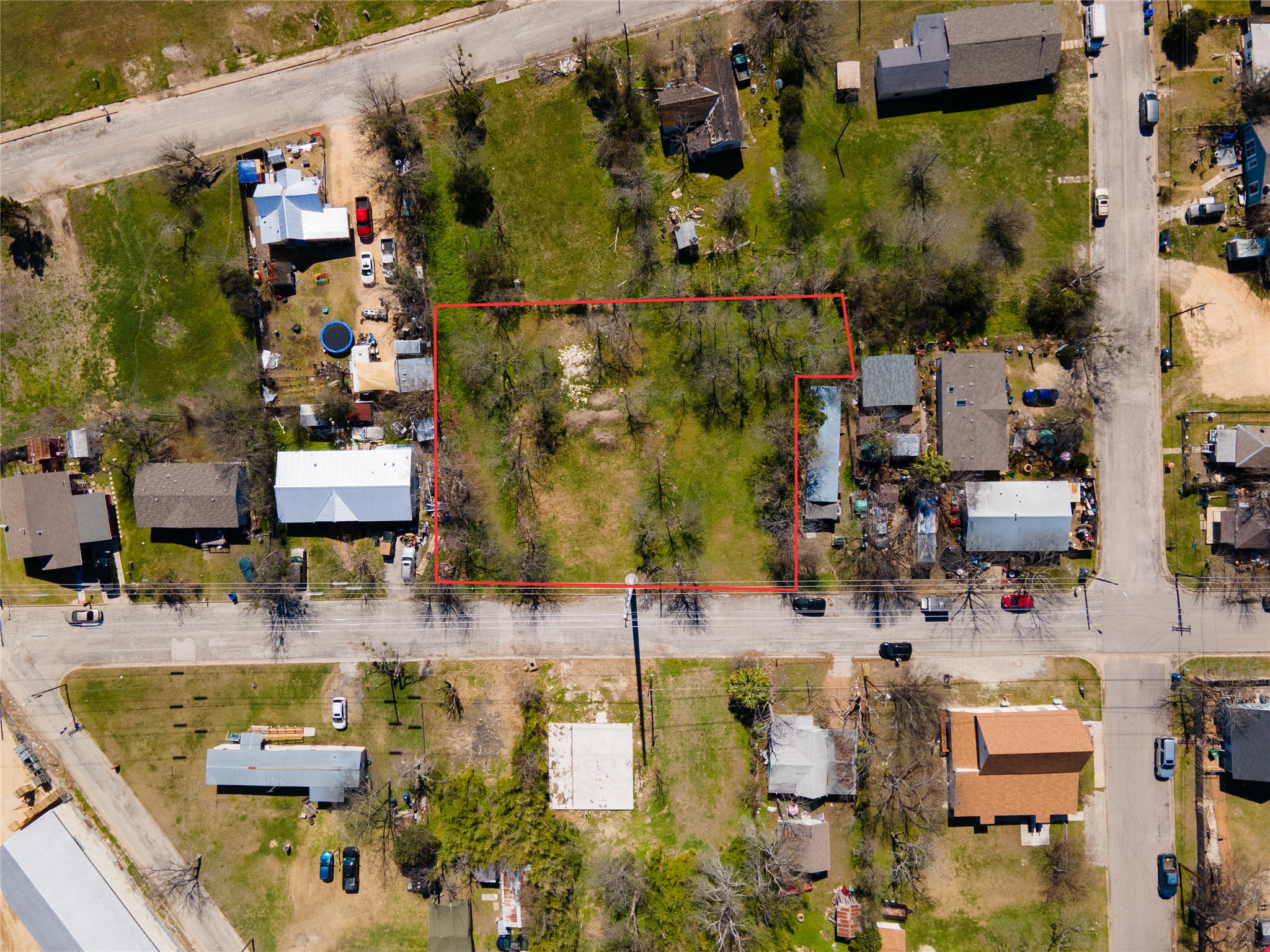 314 East Pecan Street Taylor, TX 76574 - Photo 4 of 7 Aerial perspective of suburban area with property boundaries highlighted