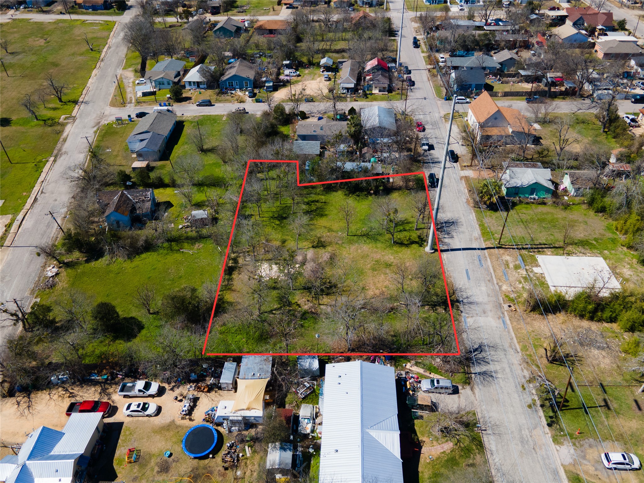 314 East Pecan Street Taylor, TX 76574 - Photo 6 of 7 Aerial view of residential area featuring property boundaries highlighted