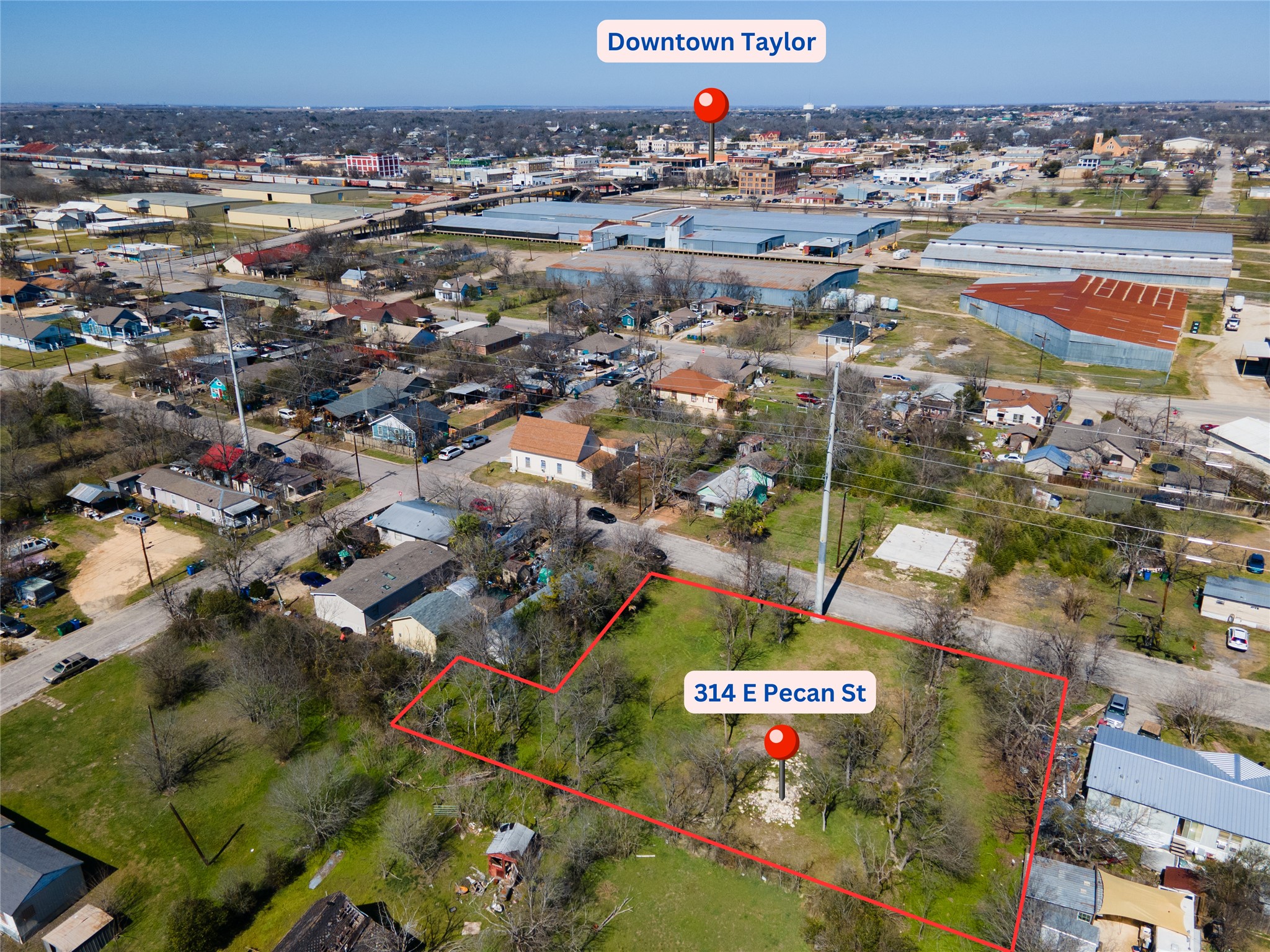 314 East Pecan Street Taylor, TX 76574 - Photo 7 of 7 Aerial view of residential area with property parcel outlined