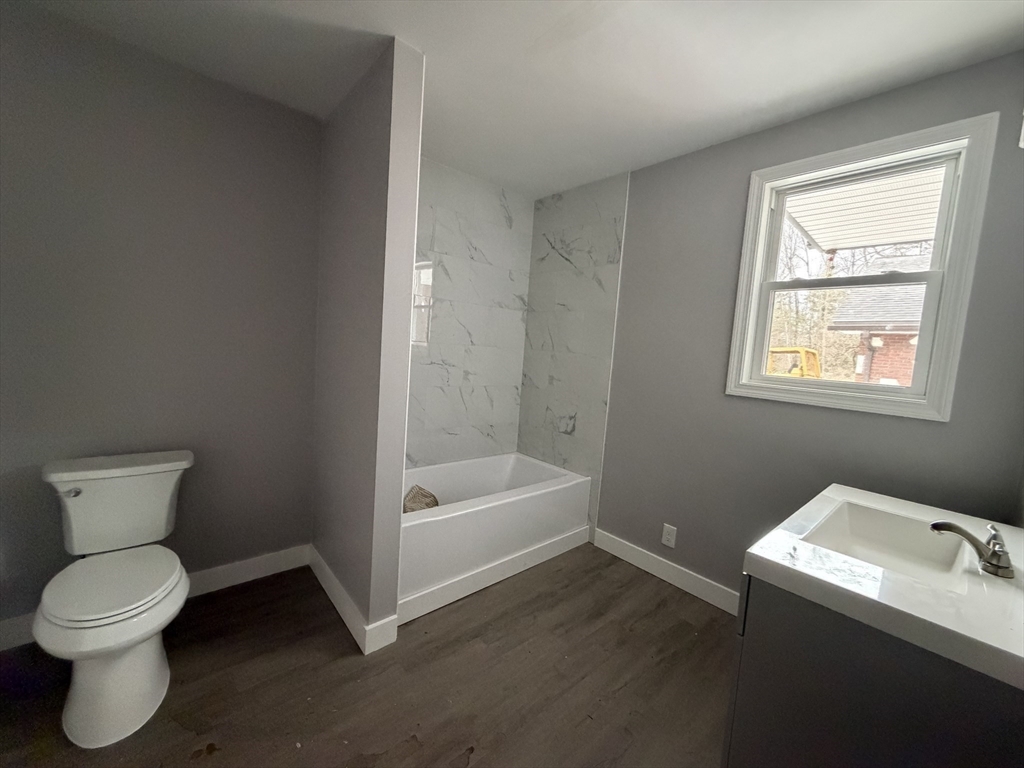 12 R Jackielyn Circle Granby, MA 01033 - Photo 18 of 23 a bathroom with a toilet sink and a bathtub