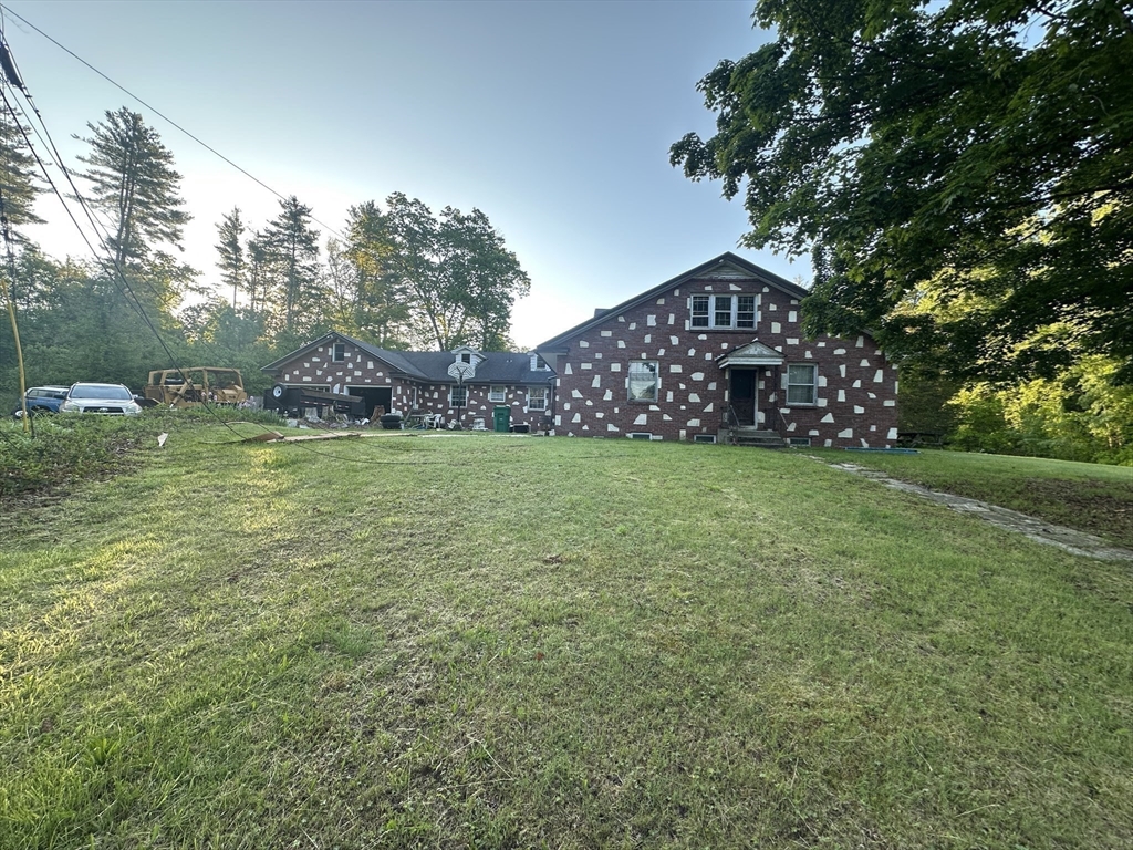 12 R Jackielyn Circle Granby, MA 01033 - Photo 5 of 23 a view of a field of grass and trees