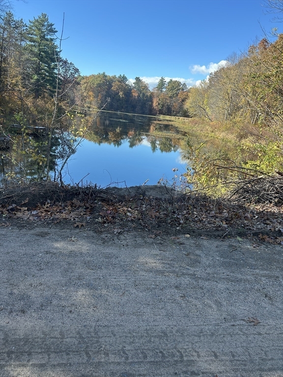 12 R Jackielyn Circle Granby, MA 01033 - Photo 9 of 17 a view of a lake from a yard