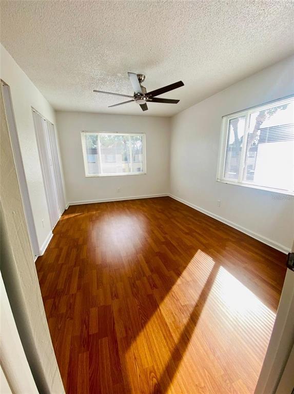 633 North Keene Road, Unit C Clearwater, FL 33755 - Photo 11 of 20 wooden floor in a hall with an entryway