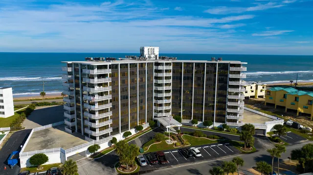a view of a balcony with chairs