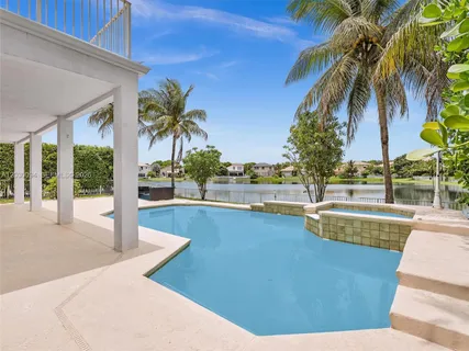 a view of outdoor space yard and swimming pool