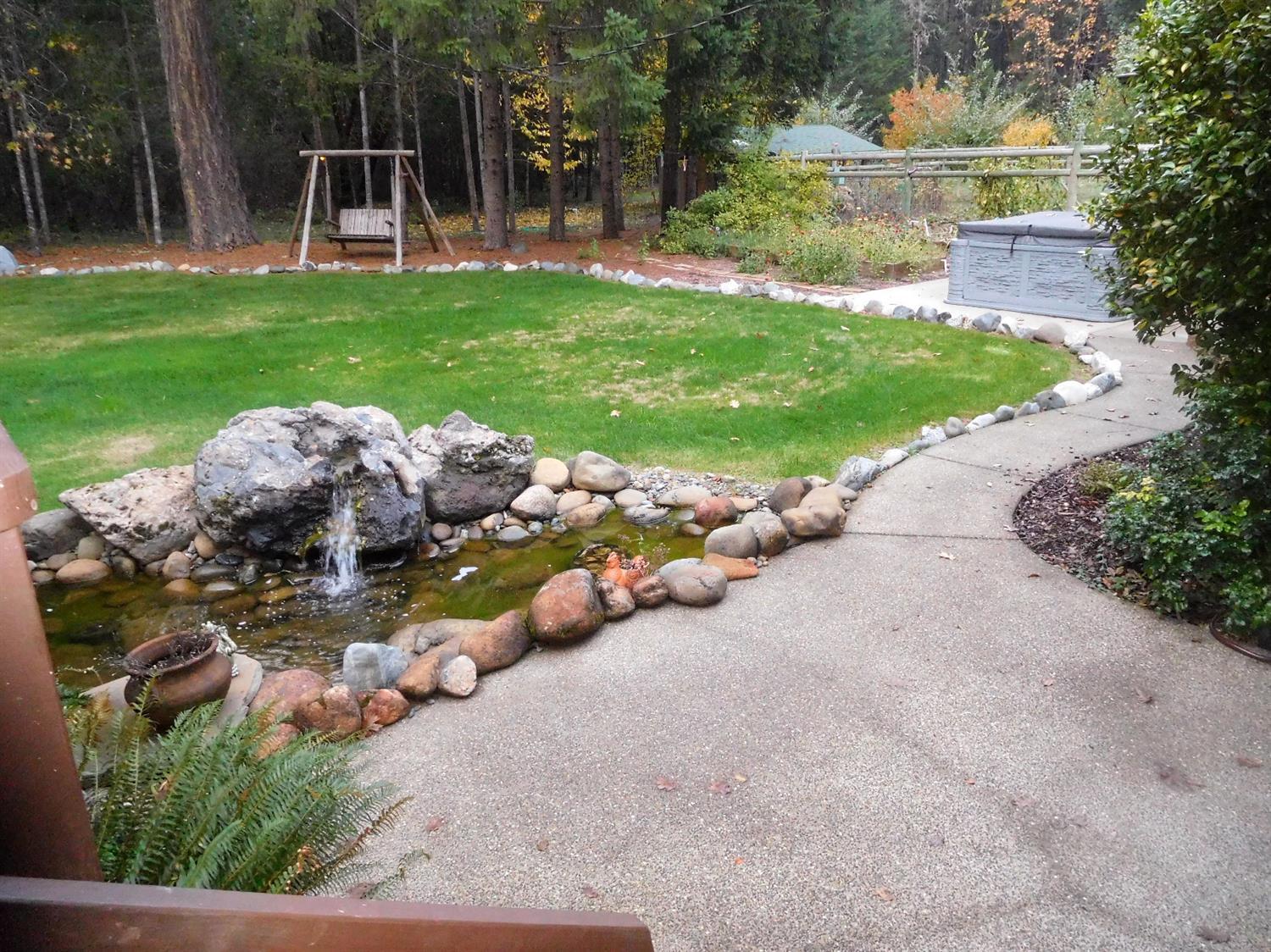 7133 Rockydale Road Cave Junction, OR 97523 - Photo 15 of 23 Water feature, (no fish) and exposed agg