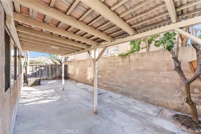a view of a room with wooden walls