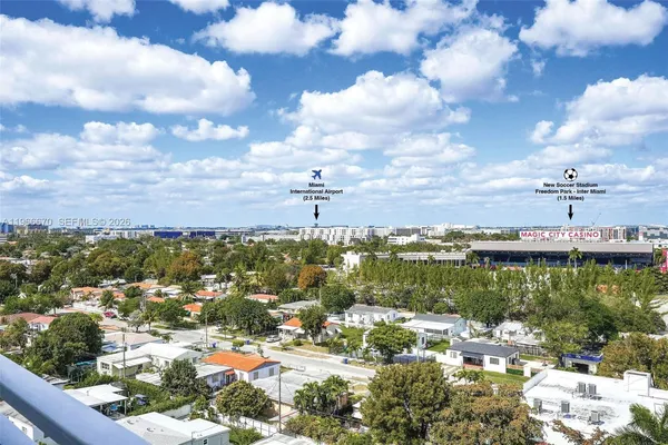 a view of a swimming pool and an outdoor seating