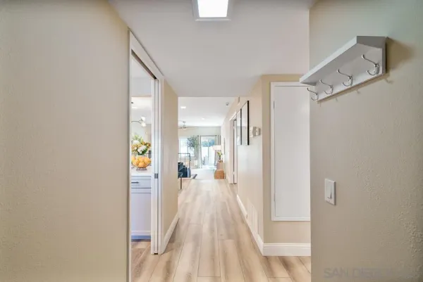 a view of a hallway with a white walls