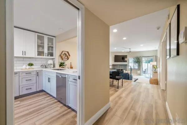 a large kitchen with cabinets