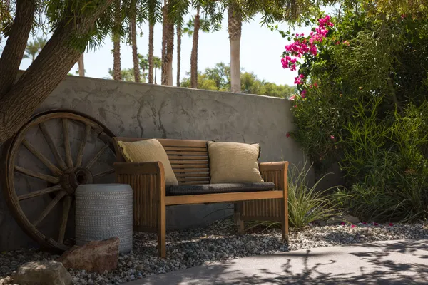 a view of a patio with couches and a fire pit